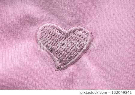 Heart symbol on fabric texture background Heart symbol on fabric texture background 132049841