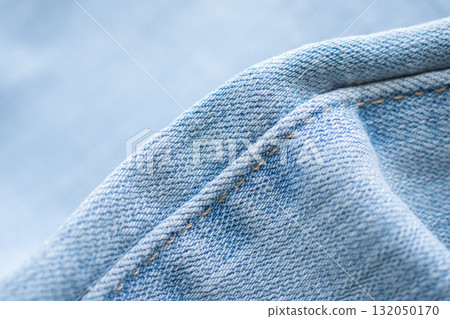 Old denim blue jeans fabric texture background close up 132050170