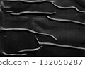 black crumpled and creased plastic poster texture background 132050287