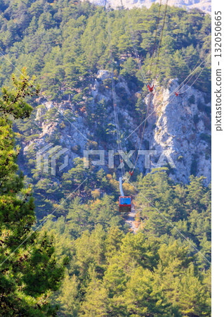 Cable car on ropeway leading to a top of Tahtali mountain in Antalya province, Turkey 132050665