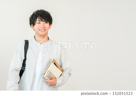 Textbooks, students with books, university students (advancement, exams, campus life) Textbooks, students with books, university students (advancement, exams, campus life) 132051523