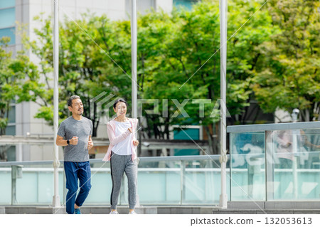 Senior couple jogging Senior couple jogging 132053613