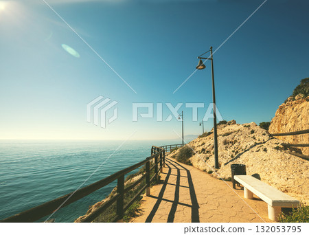 Seascape on a sunny day. Promenade along the sea. Malaga, Spain Seascape on a sunny day. Promenade along the sea. Malaga, Spain 132053795