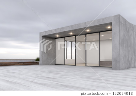 Modern minimalist house design with large glass windows and a concrete exterior in a coastal setting 132054018