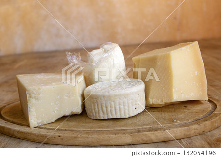 italian cheese selection on rustic wooden board italian cheese selection on rustic wooden board 132054196