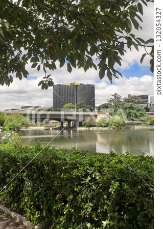 artificial lake at eur district in rome with bridge and modern buildings 132054327