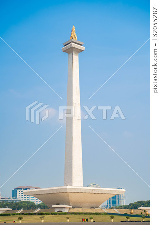 Jakarta's Monas (Independence Monument) - Indonesia's symbol towering against the blue sky 132055287