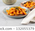 Pumpkin recipe homemade gnocchi on pastel color background 132055379