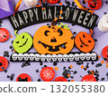 Happy halloween greetings decor with pumpkins on purple orange background 132055380