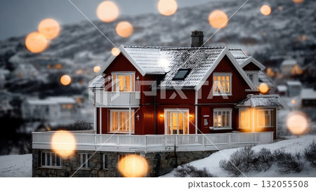 A cozy red house glows with warmth as snow blankets the landscape during a peaceful winter evening, creating a serene atmosphere A cozy red house glows with warmth as snow blankets the landscape during a peaceful winter evening, creating a serene atmosphere 132055508
