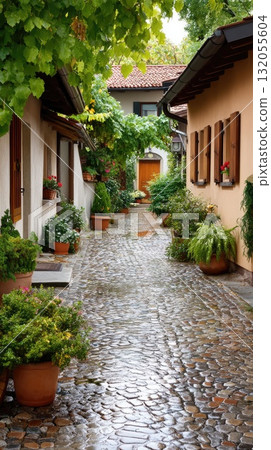 A serene pathway lined with greenery and charming buildings creates a cozy atmosphere perfect for leisurely walks and exploration A serene pathway lined with greenery and charming buildings creates a cozy atmosphere perfect for leisurely walks and exploration 132055604