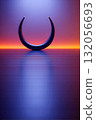 Modern abstract sculpture with vibrant lighting creates a serene atmosphere at twilight 132056693