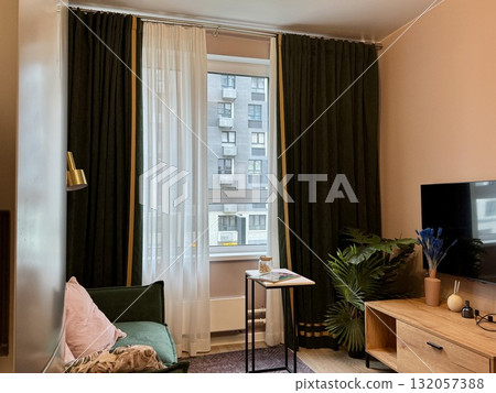 modern living room in a stylish interior of a new apartment with designer renovation modern living room in a stylish interior of a new apartment with designer renovation 132057388
