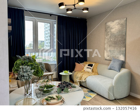 modern living room in a stylish interior of a new apartment with designer renovation 132057416