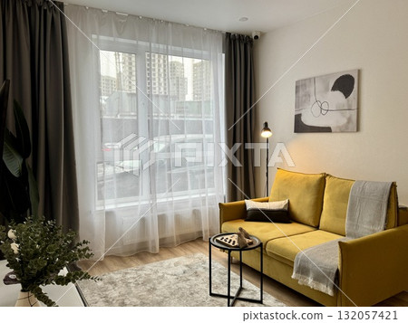 modern living room in a stylish interior of a new apartment with designer renovation 132057421