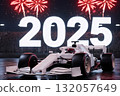 white formula bolid on track at night with large 2025 numbers 132057649