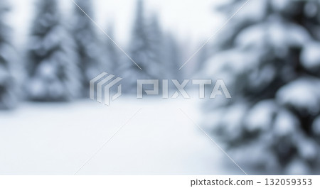 Abstract winter background with blurred snowy forest landscape, soft focus on snow covered pine trees, cool blue tones for seasonal christmas holiday design 132059353