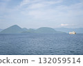 A view of a sightseeing boat and Nakajima Island on Lake Toya 132059514