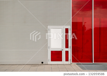 Modern door, construction detail of a building with a wide-opening door 132059586
