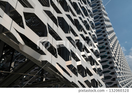 Building with shading modules, construction detail of modular expanded metal facades, architecture 132060328