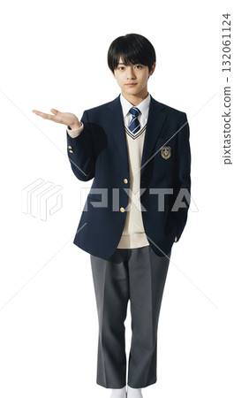 A high school boy guiding with his palm facing up 132061124