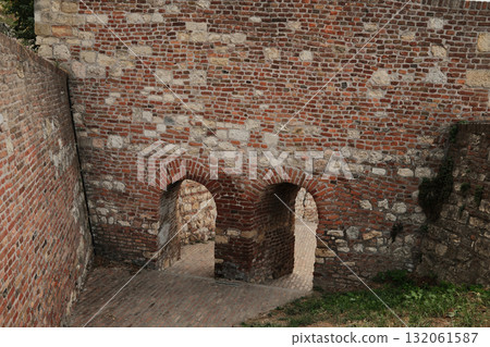 Brick fortress wall with two arched passageways in Kalemegdan, Belgrade Brick fortress wall with two arched passageways in Kalemegdan, Belgrade 132061587