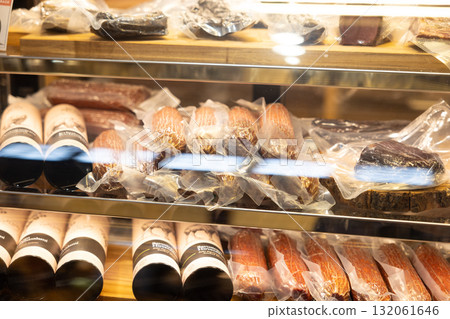 European sausage and wine shop glass case 132061646