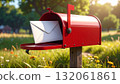 Mail being delivered to a red mailbox surrounded by flowers in a sunny garden setting 132061861