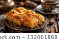 Chebakia honey pastries served with tea during Ramadan celebrations in a cozy setting 132061868