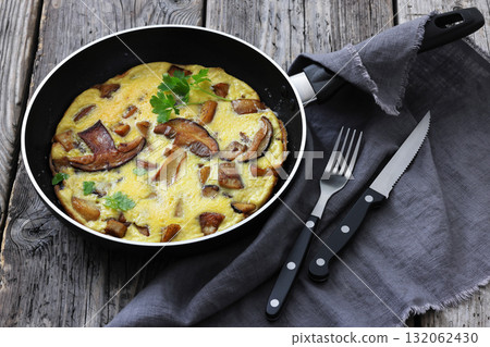 tasty porcini mushroom parmesan omelette, top view tasty porcini mushroom parmesan omelette, top view 132062430