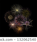 Fireworks of various colors and shapes burst in night sky 132062540