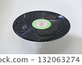 Washing dirty old records with water 132063274
