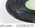 Washing dirty old records with water 132063275