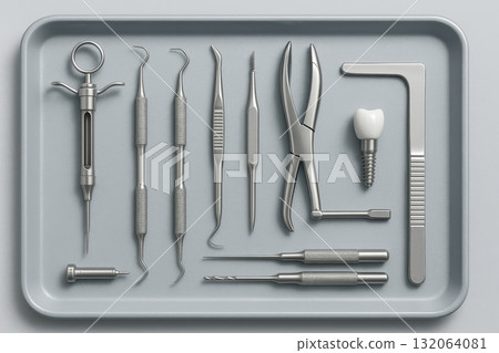 Dental tools and instruments for implant surgery on metal tray, including pliers, drills, and dental implant components. 132064081