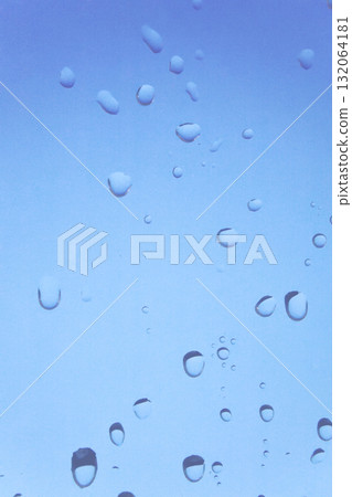 Window glass with water droplets. Transparent abstract blue background. Humidity, condensation, raindrops Window glass with water droplets. Transparent abstract blue background. Humidity, condensation, raindrops 132064181
