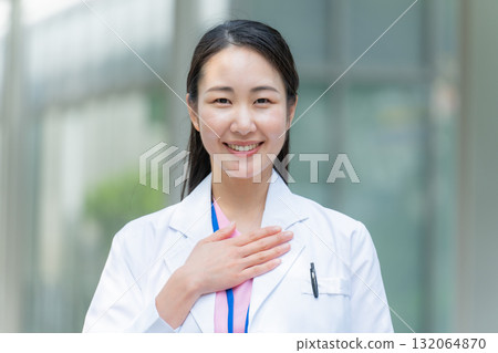 Woman in white coat, outdoor, leave it to us Woman in white coat, outdoor, leave it to us 132064870