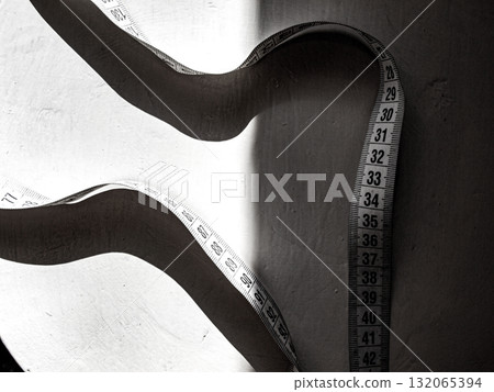 Ribbon ruler. Abstract black and white poster. Ribbon ruler. Abstract black and white poster. 132065394