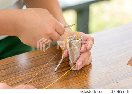 Making a mini bronze bell: threading the string 132065526