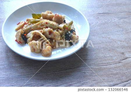 spicy stir fried slice bamboo shoot and fish ball with curry on plate spicy stir fried slice bamboo shoot and fish ball with curry on plate 132066546