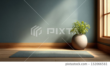 Serene yoga mat lies on wooden floor beside potted plant, bathed in soft natural light from window 132066581