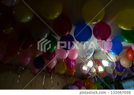 Ceiling Filled with Colorful Party Balloons and Hanging Strings Ceiling Filled with Colorful Party Balloons and Hanging Strings 132067098