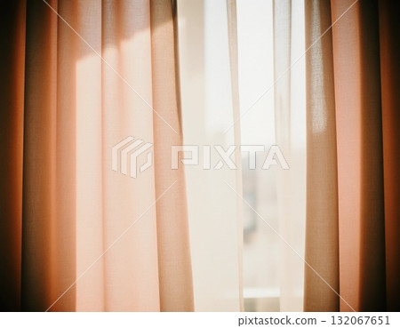 Peach and beige curtains sway slightly in the breeze, allowing warm sunlight to softly illuminate a cozy room, creating an inviting atmosphere during the afternoon Generative AI Peach and beige curtains sway slightly in the breeze, allowing warm sunlight to softly illuminate a cozy room, creating an inviting atmosphere during the afternoon Generative AI 132067651