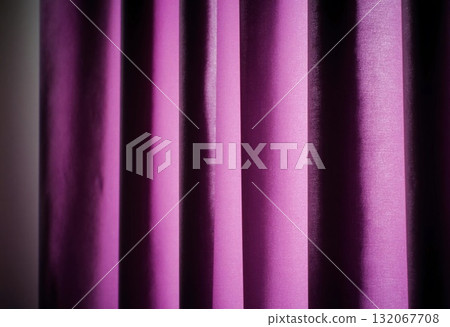 Soft purple lilac curtains gracefully hang, filtering warm afternoon light in a comfortable living room, creating a calm and inviting atmosphere for relaxation Generative AI 132067708