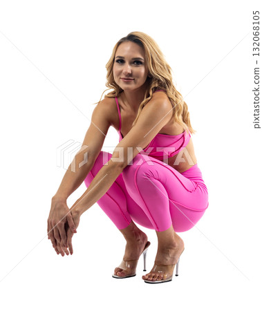 Athletic woman smiling, posing in pink fitness outfiton on transparent background 132068105