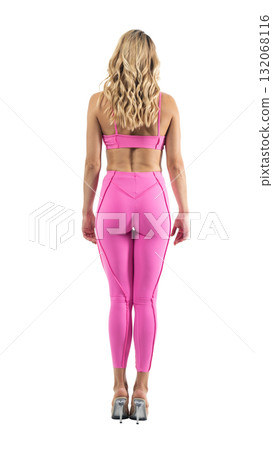 Athletic woman smiling, posing in pink fitness outfiton on transparent background 132068116