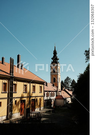Scenic view of Grgeteg Monastery tower and buildings under clear blue sky in Fruska Gora National Park. Serbia country 132068307
