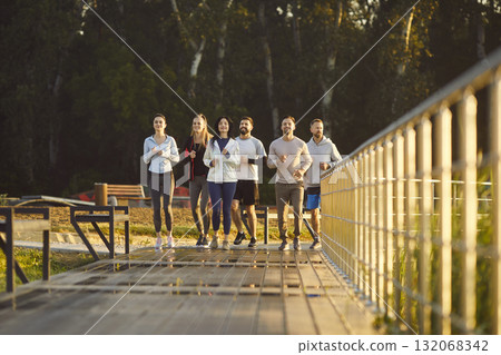 Group Running Together In Team Workout Group Running Together In Team Workout 132068342