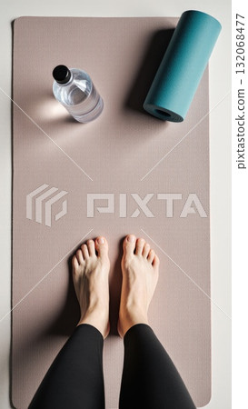 Post Workout Recovery Flat Lay with Bare Feet on Mat Post Workout Recovery Flat Lay with Bare Feet on Mat 132068477