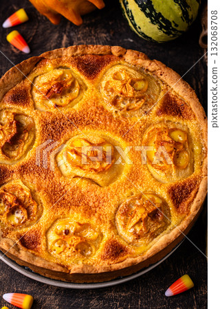 Halloween apple pie with scary faces Halloween apple pie with scary faces 132068708