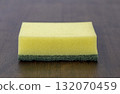 Yellow sponge green scrub pad cleaning tool household item dishwashing sponge kitchen cleaning abrasive pad porous foam hygiene sanitation feeling 132070459